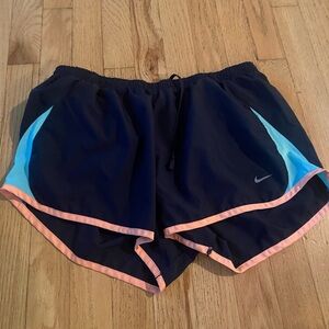 Nike Black and Pink Athletic Shorts for Performance